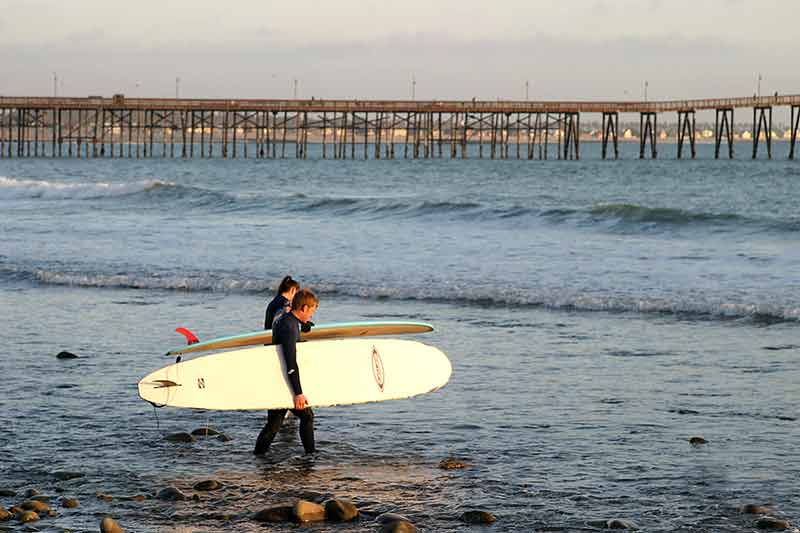 things to do in ventura california two surfers carrying boards