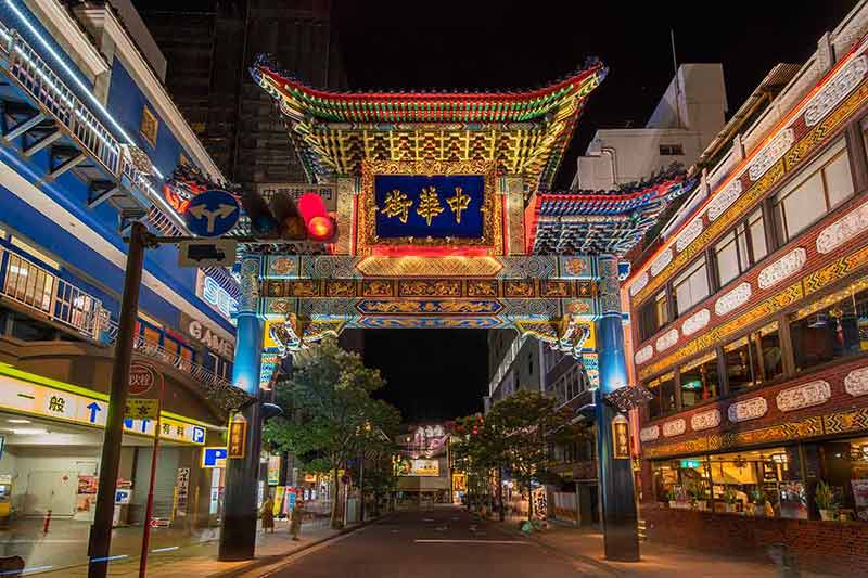 things to do in yokohama chinatown large blue Chinese portal through which the sun rises whose protective animal is the blue dragon