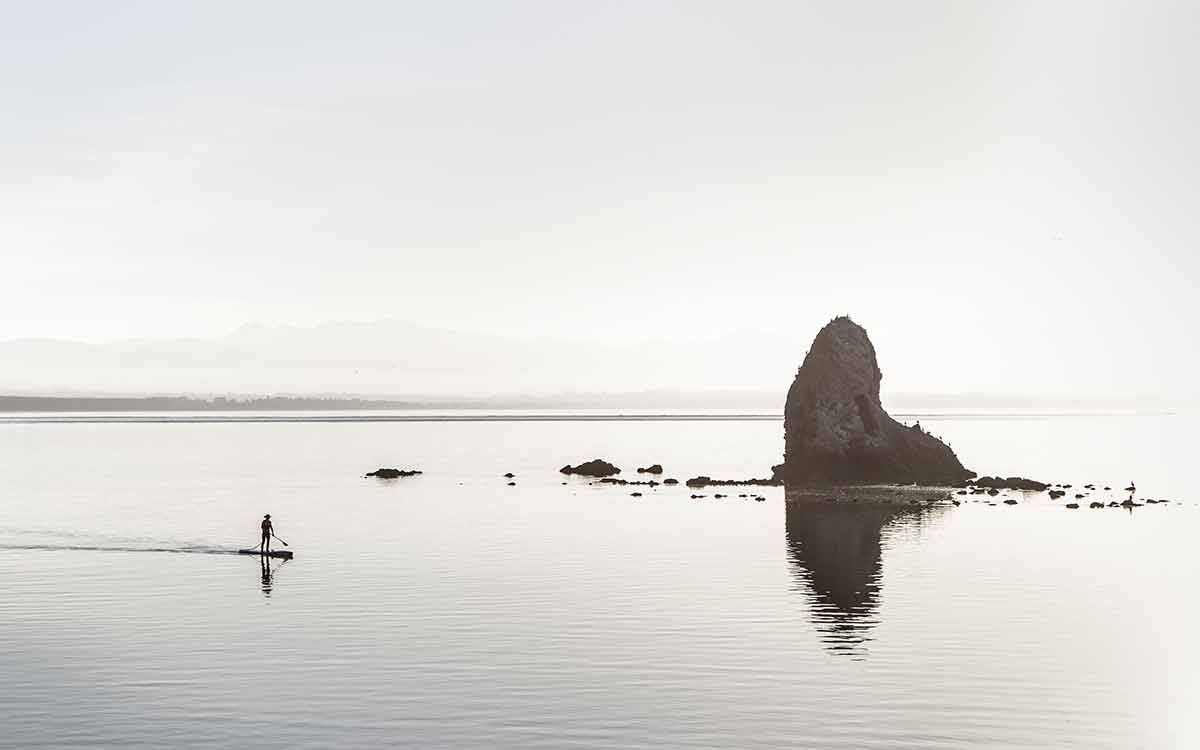 paddleboarder near the stunning Fifeshire Stack