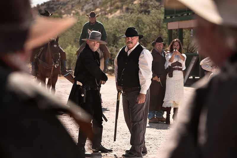 actors dressed in period clothing at a gunfight