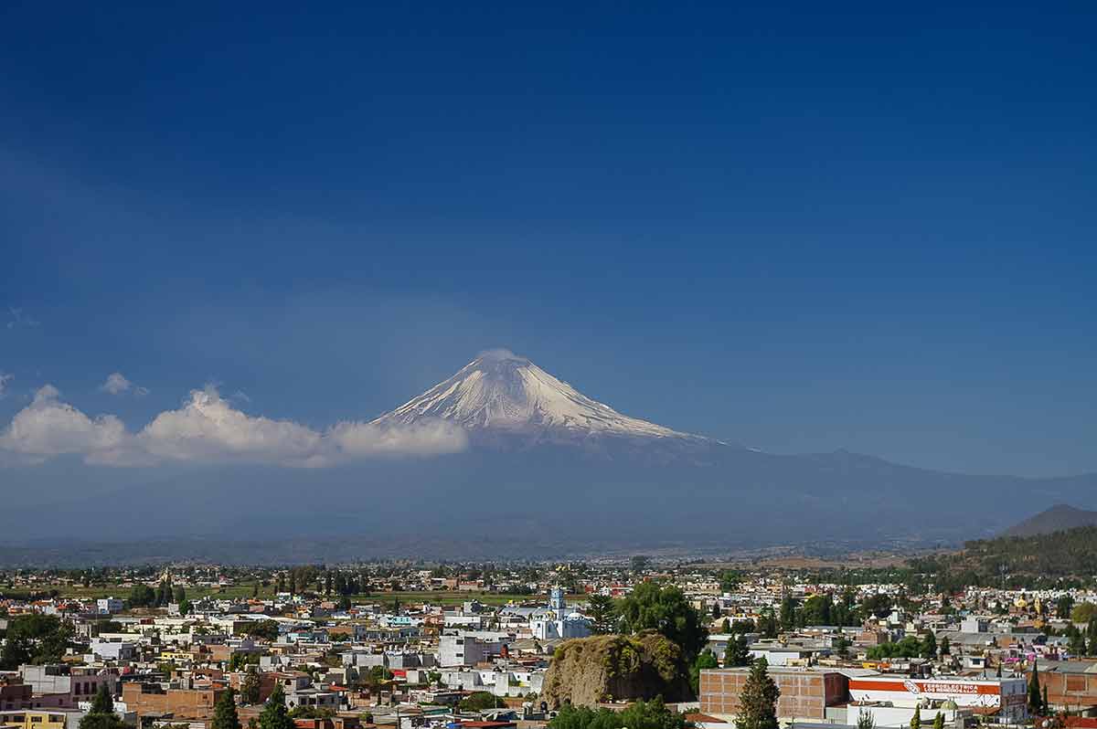 Popocatepetl Volcano is a stunning backdrop to the town of Puebla