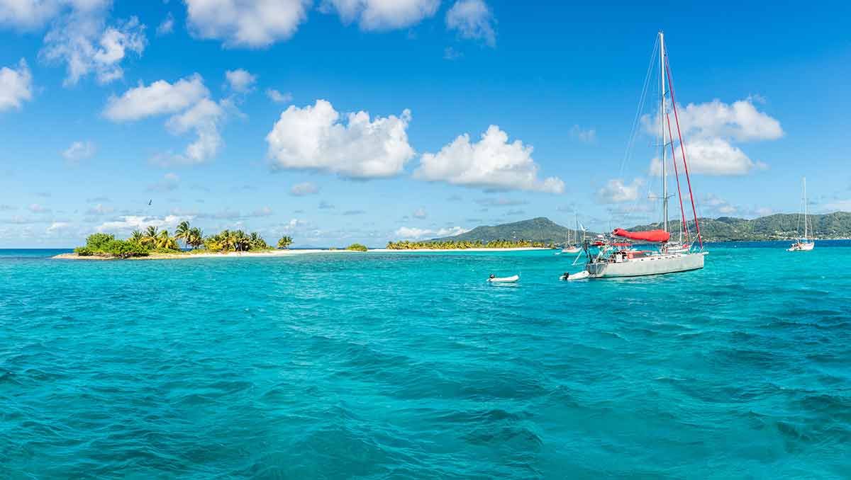 Turquoise Sea And Anchored Yachts Near Carriacou Island