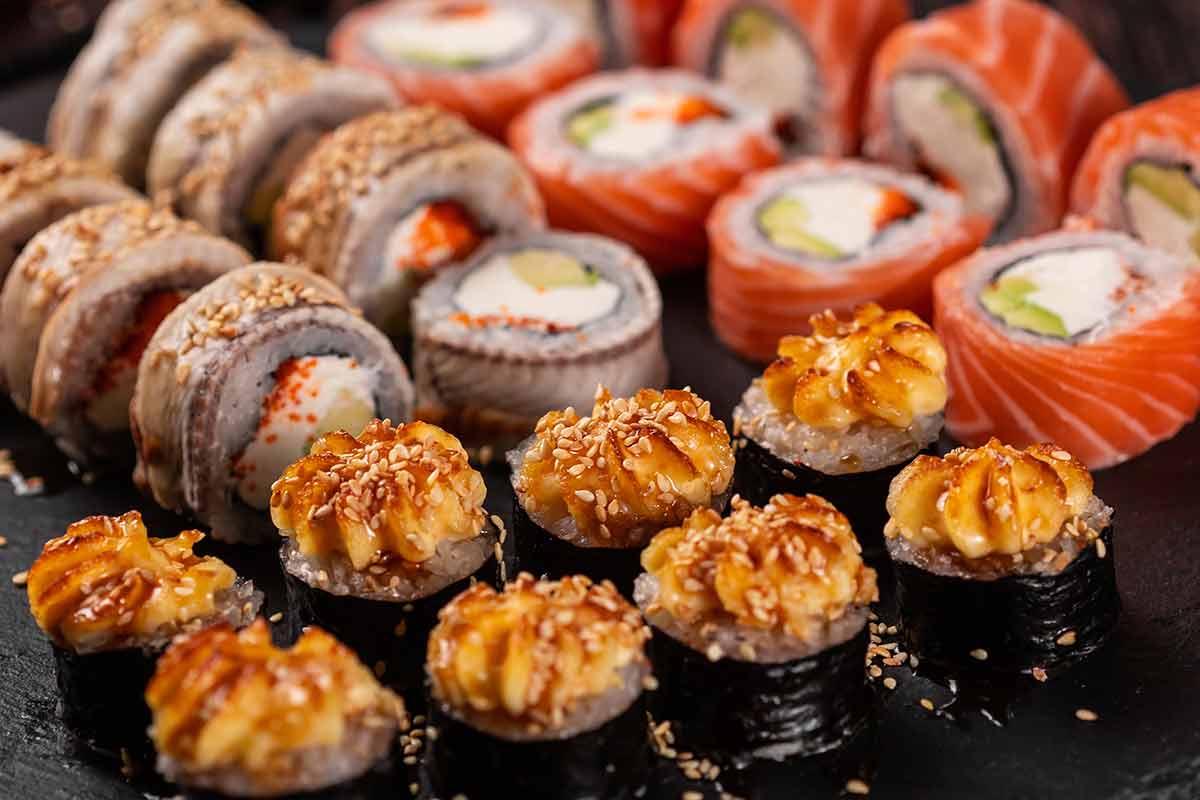 Rolls Set With Fish Shrimp And Caviar Sushi With Chopsticks