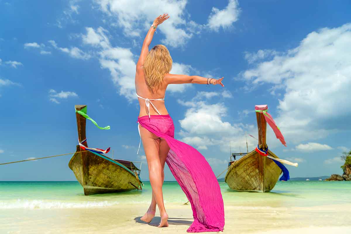 best beaches in asia Woman on Tropical beach
