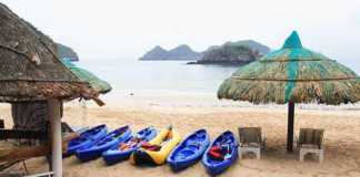 Hidden Paradise: 20 Beachfront Villas and Jawdropping Overwater Bungalows In Vietnam! top beaches in vietnam have kayaks, umbrellas and other facilities