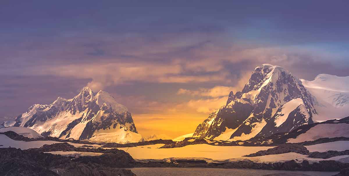 top landmarks in Antarctica mountains at dawn