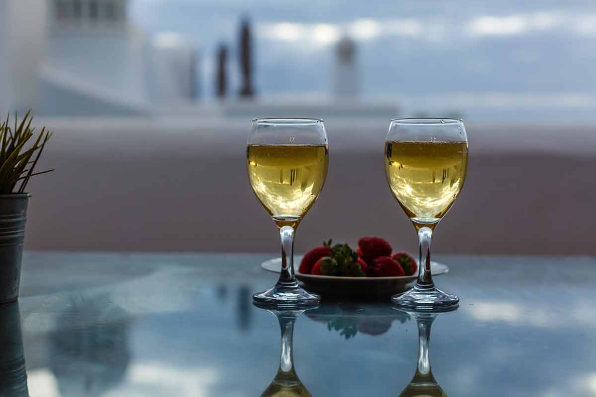 Two Glasses Of Champagne At Rooftop Restaurant