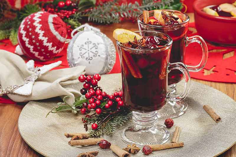 traditional german christmas drinks mulled wine with fruits and spices.