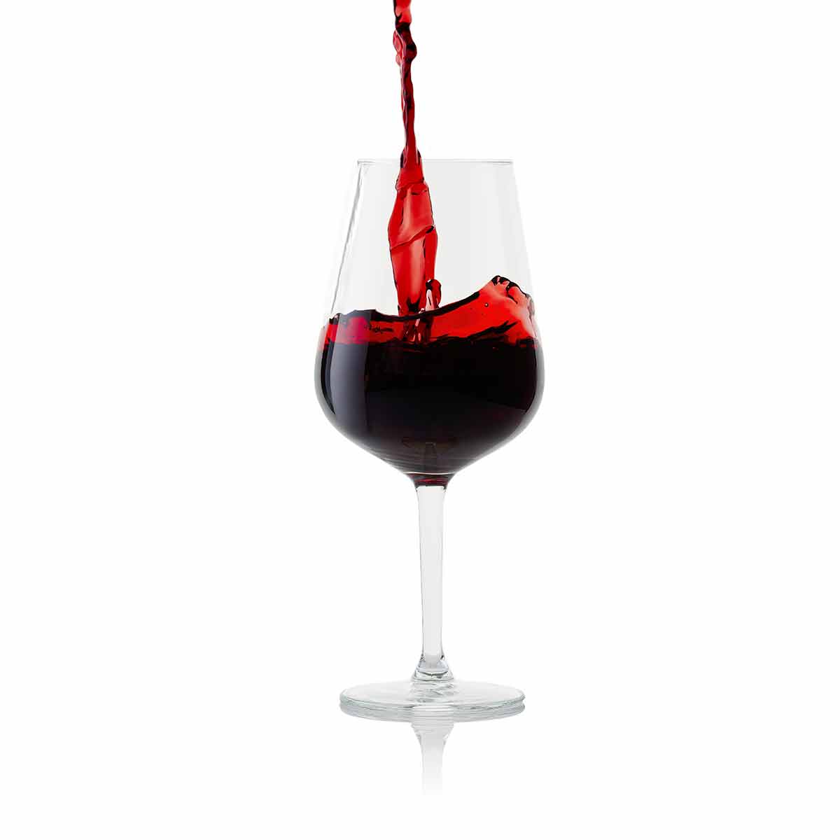traditional italian drinks red wine with splash in glass isolated on white background