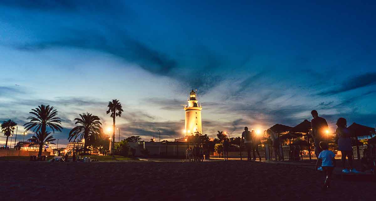 travel spain in winter Malaga lighthouse at night