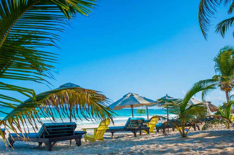 tulum beach hotels la cabanas lounges and umbrellas on the sand