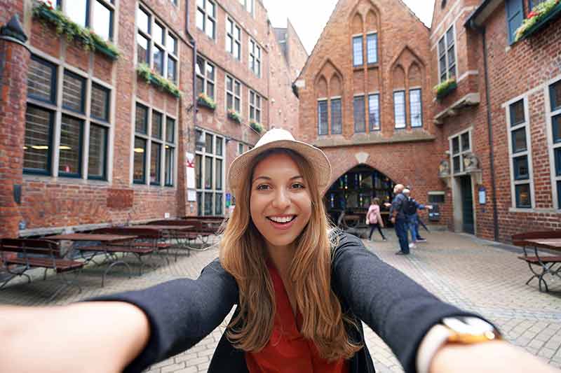 Tourist Girl Takes Self Portrait In Bottcherstrasse