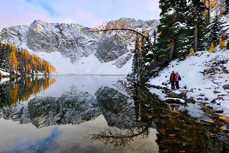 washington state national parks north cascades man and woman winter snowshoe