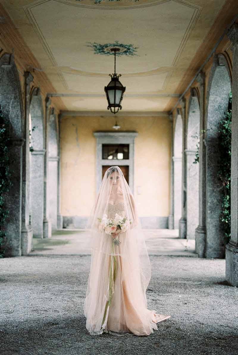 Bride In A Dress With A Veil wedding villas in Italy.