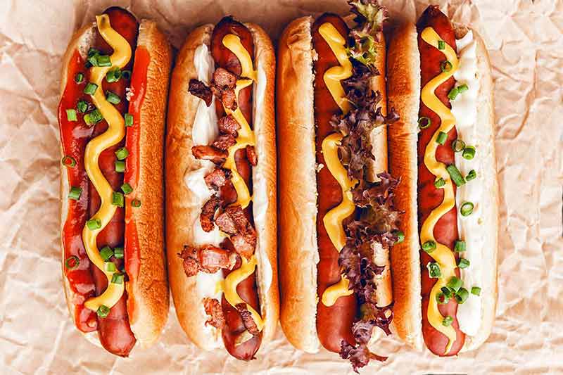 Barbecue Grilled Hot Dogs With Yellow American Mustard