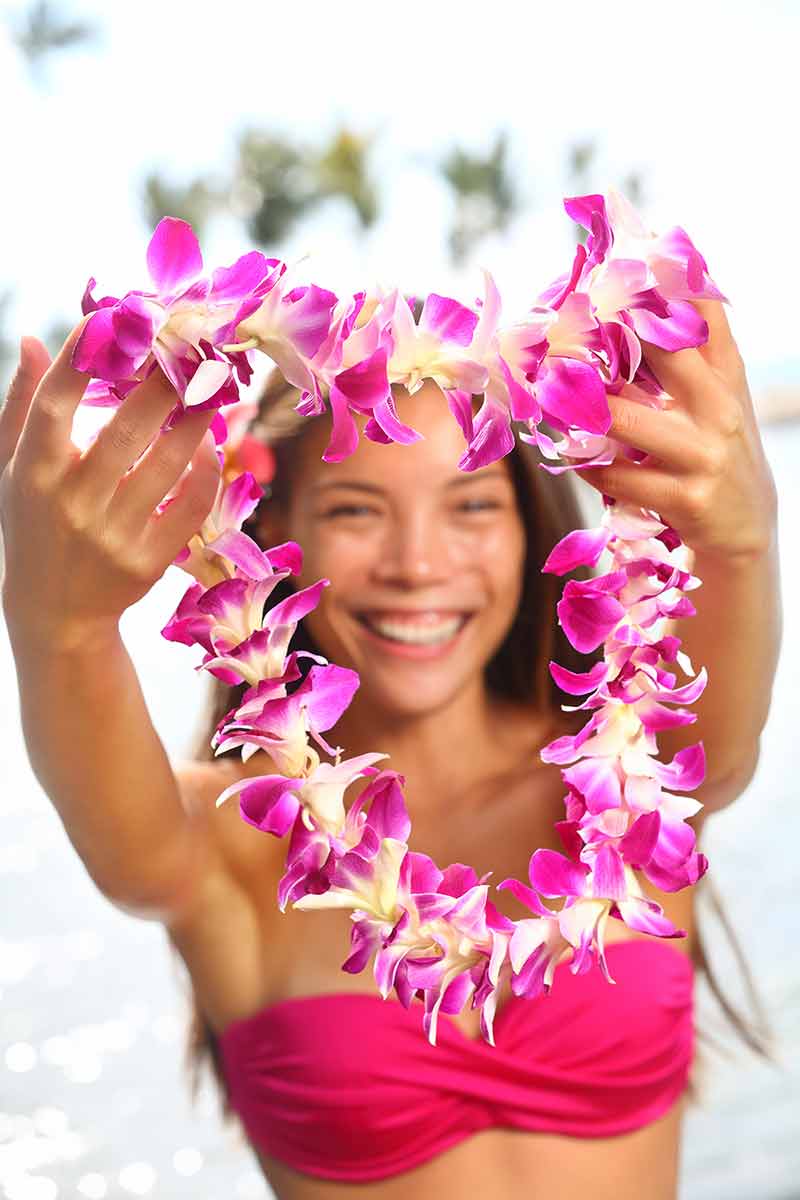 Hawaii Woman Showing Flower Lei Garland