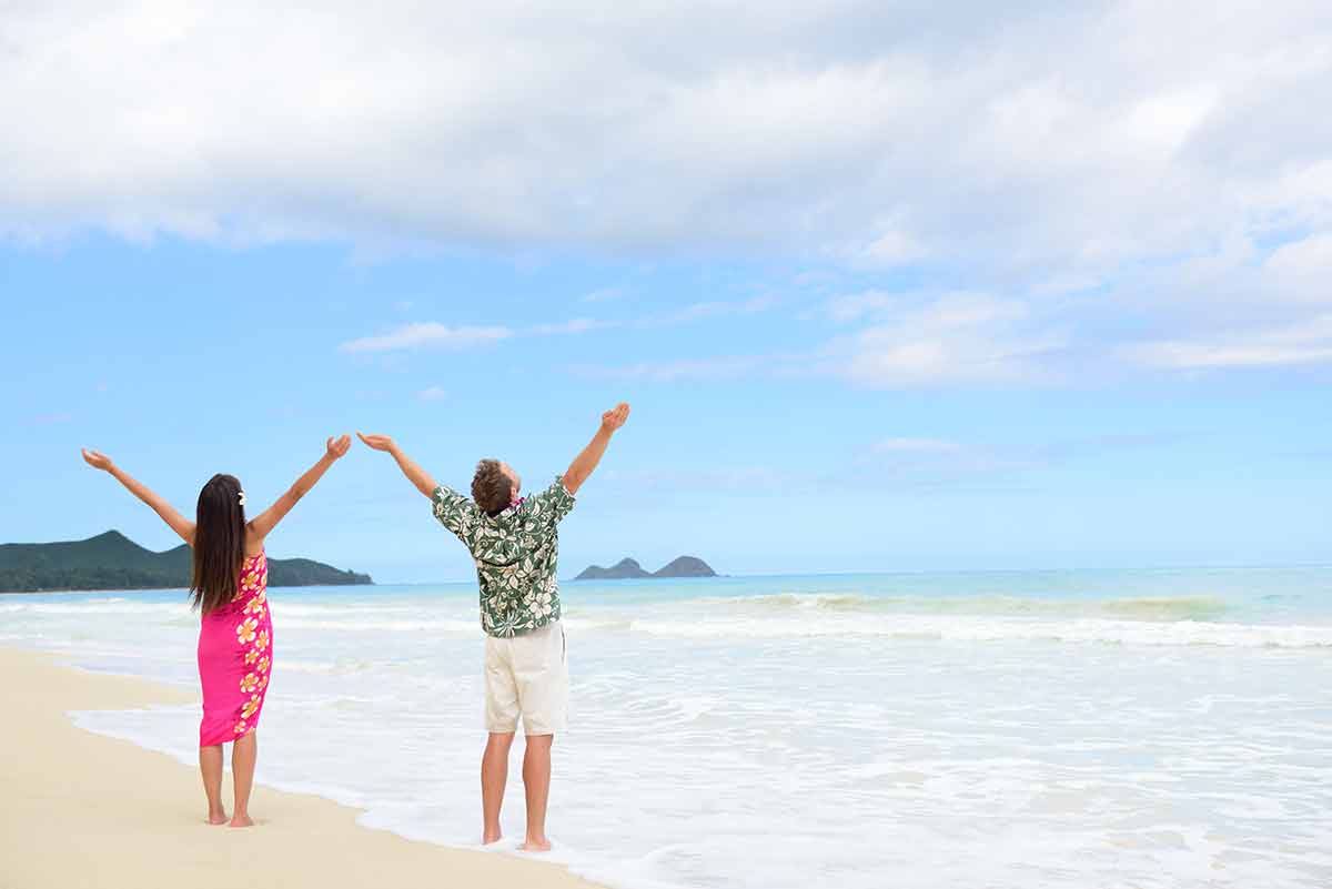Happy Freedom Couple On Hawaiian Beach Vacations