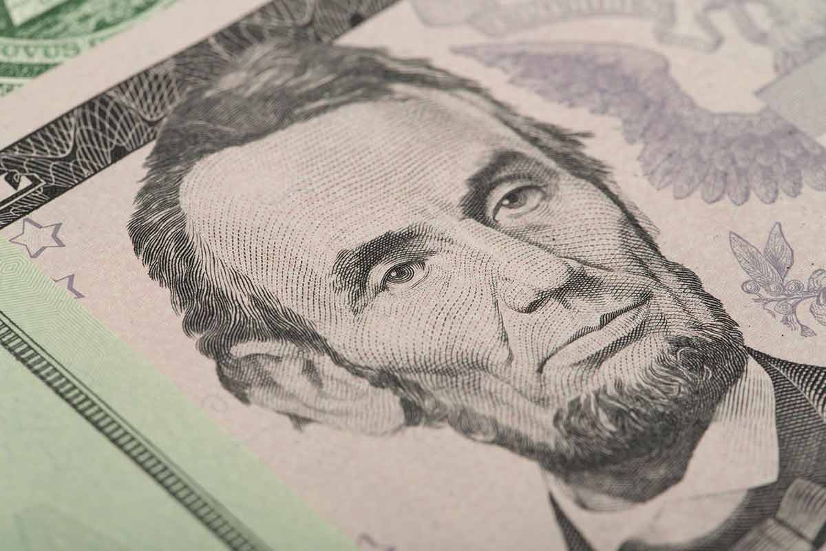 Macro Of Abraham Lincoln On Five USA Dollar Banknote