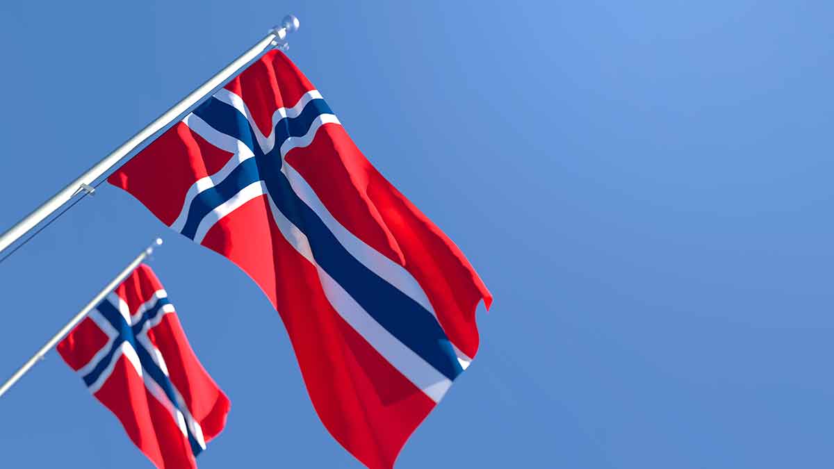 The National Flag Of Norway Waving In The Wind