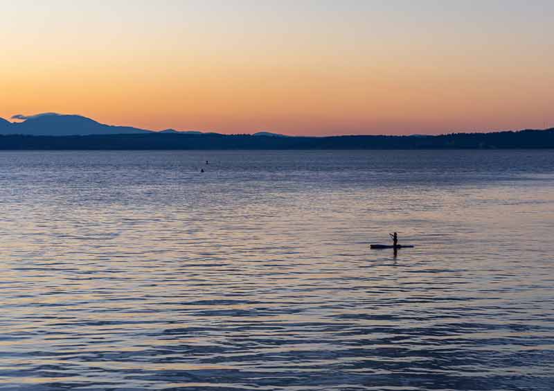 Paddleboarding At Sunset On Puget Sound