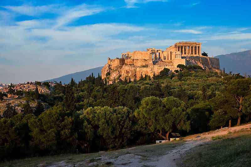 what is the best time to visit greece Parthenon Temple at the Acropolis of Athens as seen from Philopappos Hill on sunset