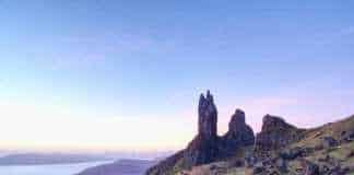 what is the best time to visit scotland rocks jutting out at dawn