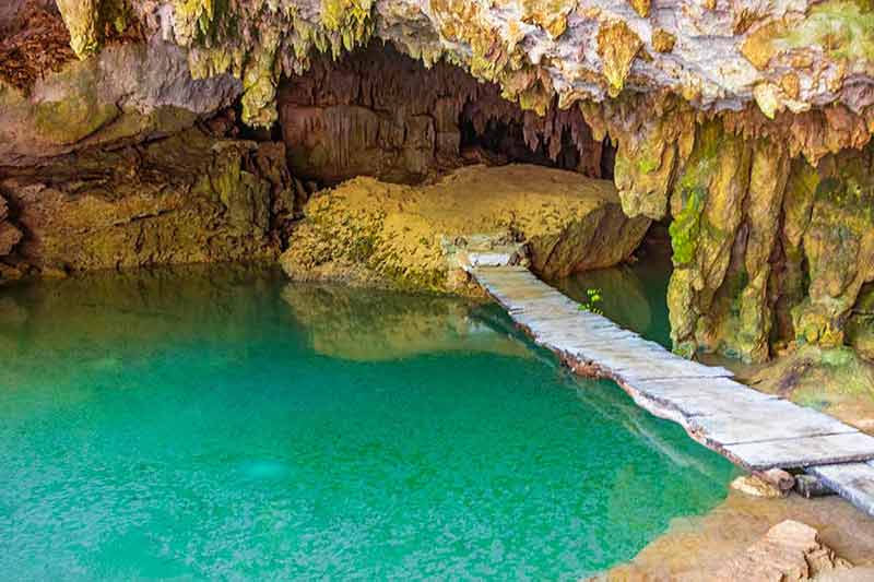what to do in cancun with kids Amazing blue turquoise water and limestone cave sinkhole cenote