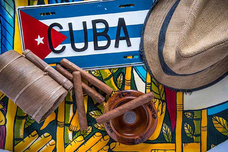 cuban cigars, hat and flag