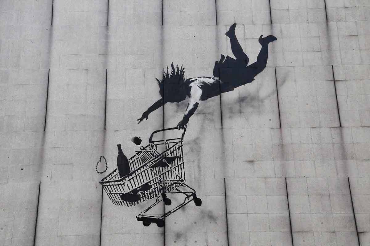 when is the best time to visit england Banksy graffiti artwork