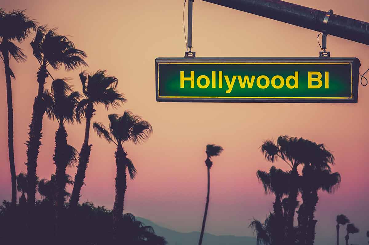 where is the best place to stay in los angeles A Hollywood Blvd Sign At Sunset With Palm Trees In Los Angeles