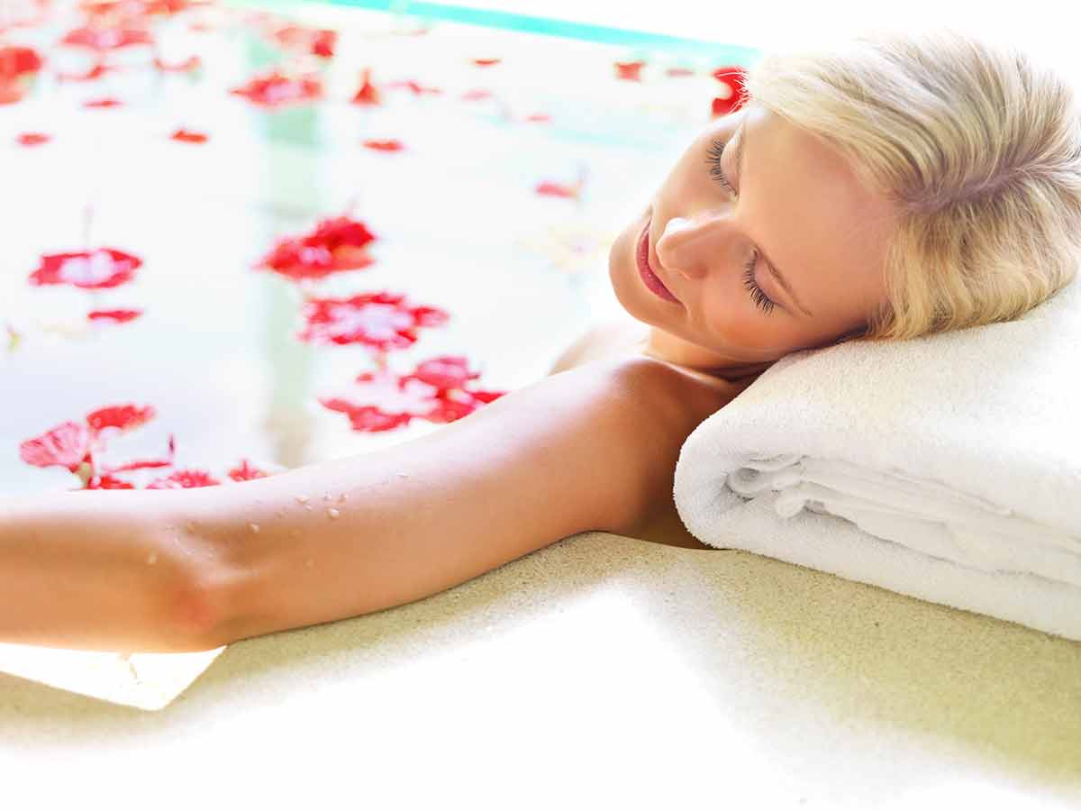 Relax, Spa And Flowers With Woman In Bath For Skincare