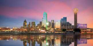 where to stay in dallas for nightlife city skylne reflected in the Trinity River
