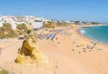 Sandstone Rock On The Beach In Albufeira In Portugal