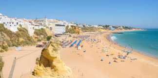 Sandstone Rock On The Beach In Albufeira In Portugal