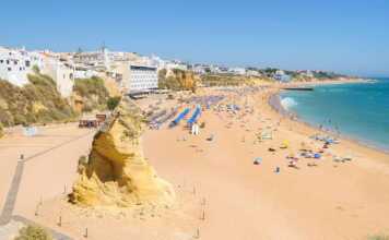 Sandstone Rock On The Beach In Albufeira In Portugal