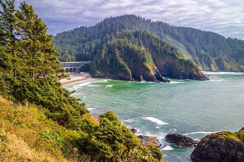 which five beaches are on the oregon coast Waves at Heceta Head Lighthouse State Park