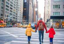Family Of Father And Little Kids On Times Square