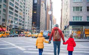 Family Of Father And Little Kids On Times Square