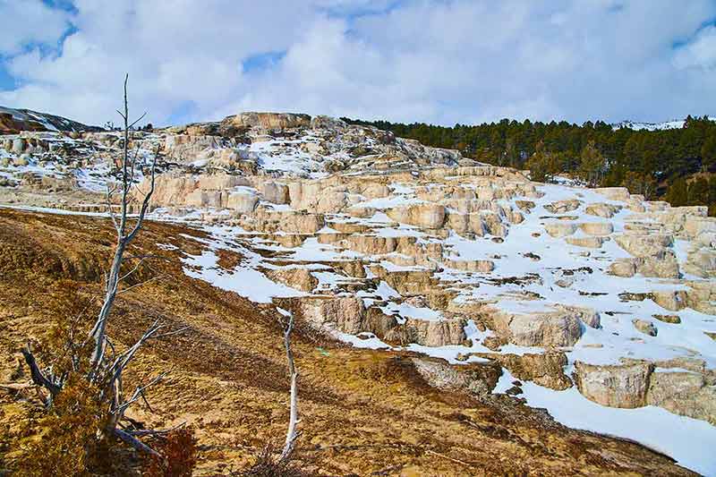 Winter Hits Yellowstone With Snow-Covered Terraces