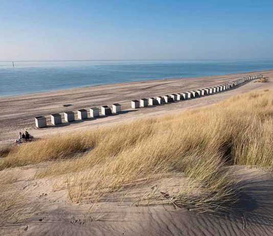 zeeland beaches netherlands row of beach huts